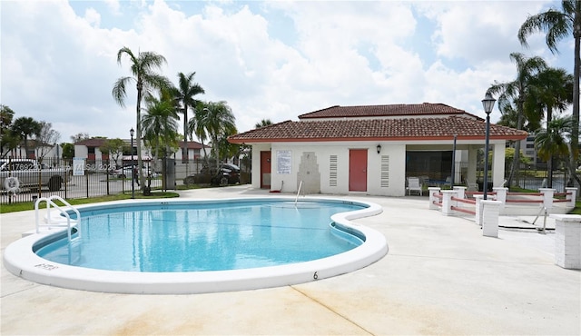 1170 N Hiatus Rd Unit 1170, Pembroke Pines, FL 33026 - community pool with a patio