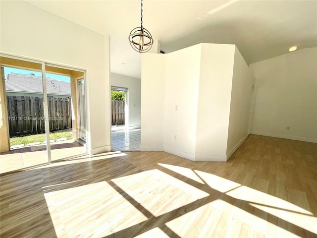 12268 SW 145th St, Miami, FL 33186 - unfurnished dining area with wood finished floors and a chandelier