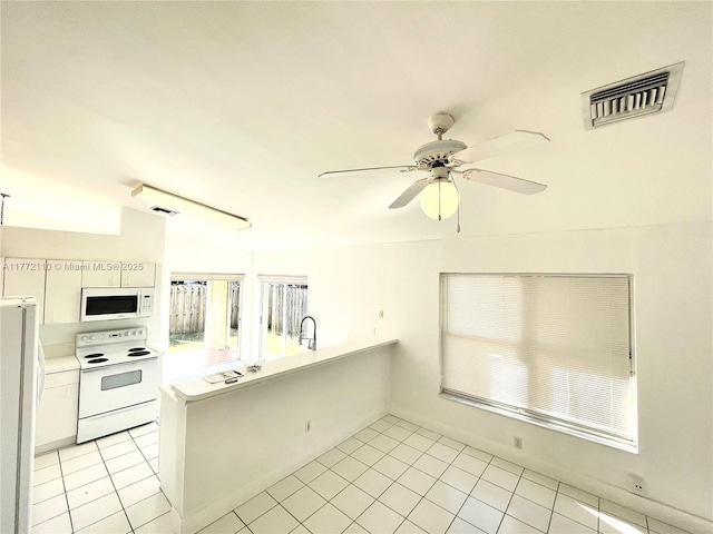 12268 SW 145th St, Miami, FL 33186 - kitchen with white appliances, a peninsula, light tile patterned flooring, ceiling fan, and light countertops