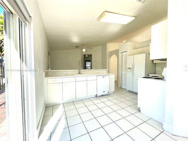 12268 SW 145th St, Miami, FL 33186 - kitchen with white appliances, a peninsula, a ceiling fan, light countertops, and white cabinetry