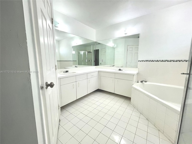 12268 SW 145th St, Miami, FL 33186 - bathroom with tile patterned floors, a garden tub, and double vanity