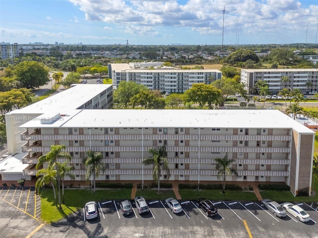 birds eye view of property with a city view
