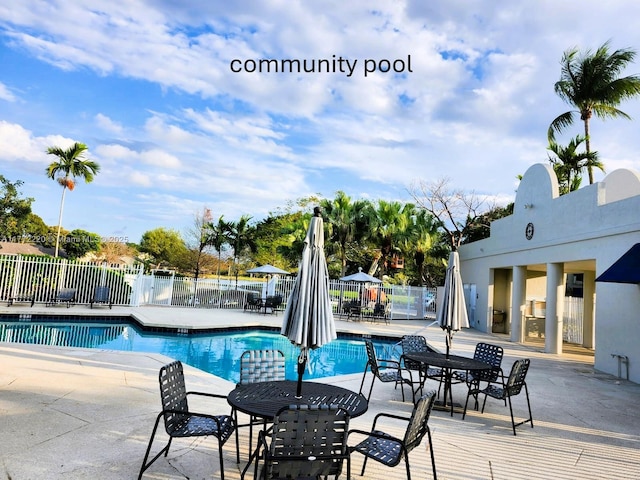 575 NW 98th Ave, Plantation, FL 33324 - community pool featuring a patio area