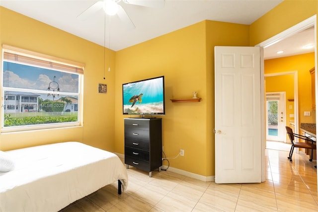 3091 SW 195th Ter, Miramar, FL 33029 - bedroom with light tile patterned floors, baseboards, and ceiling fan
