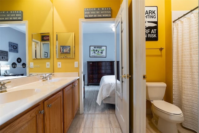 3091 SW 195th Ter, Miramar, FL 33029 - bathroom featuring double vanity, a sink, ensuite bath, and toilet