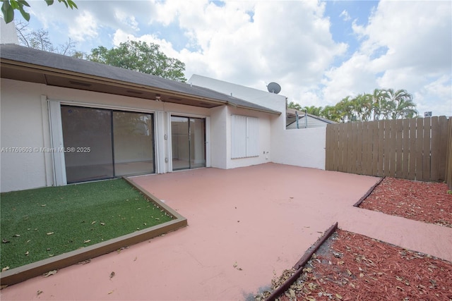 view of patio with fence
