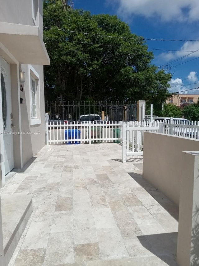 view of patio with fence