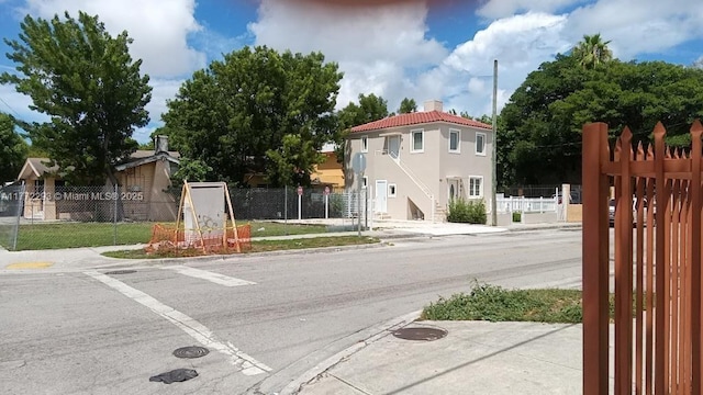 view of road featuring sidewalks and curbs