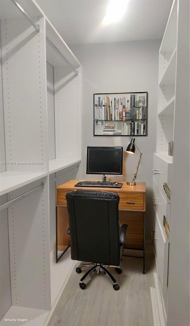 office with light wood-style floors