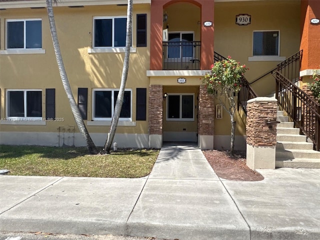 view of property with stairs