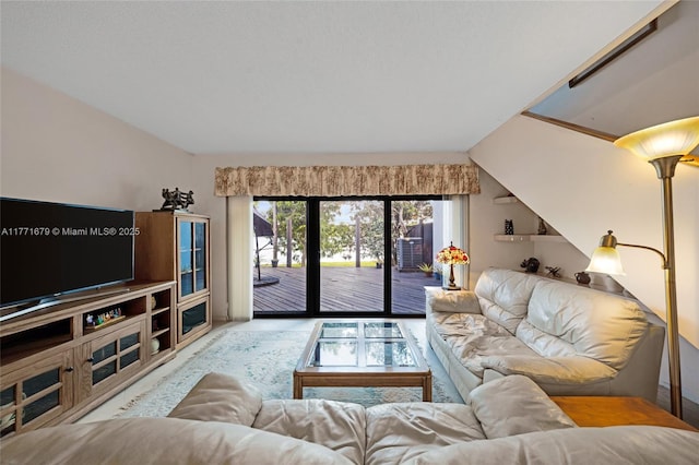 living room with lofted ceiling