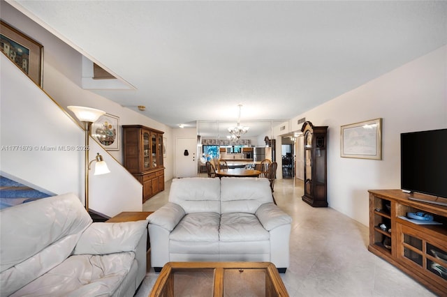 living area featuring a notable chandelier