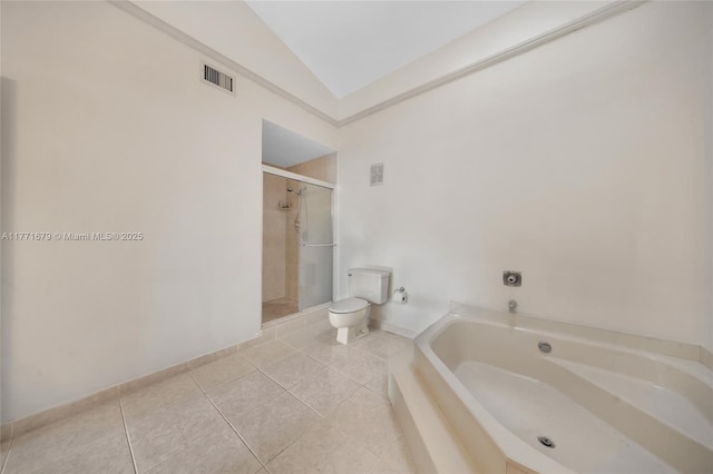 bathroom featuring a bath, visible vents, a stall shower, toilet, and lofted ceiling