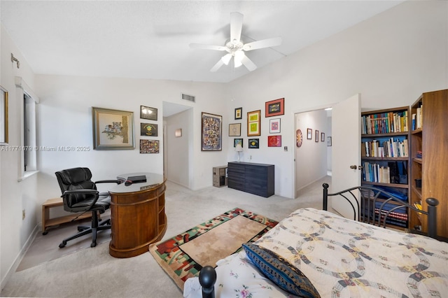 carpeted bedroom featuring baseboards, a ceiling fan, vaulted ceiling, and visible vents