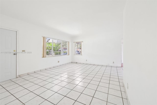 1121 SW 36th Ave, Miami, FL 33135 - empty room featuring light tile patterned floors