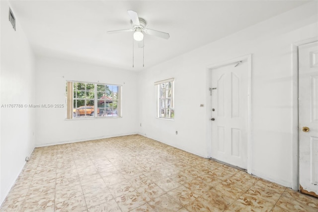 1121 SW 36th Ave, Miami, FL 33135 - spare room featuring tile patterned floors, visible vents, and ceiling fan
