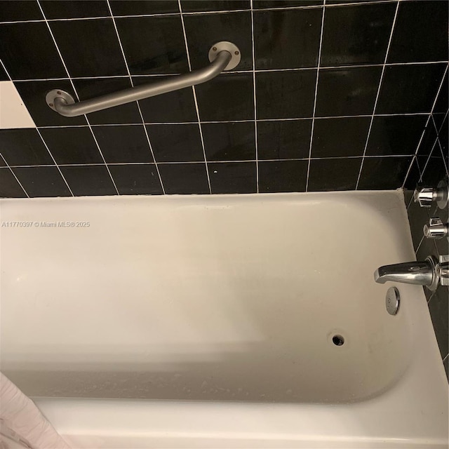 1680 NE 191st St Unit 107-2, Miami, FL 33179 - bathroom featuring a bath