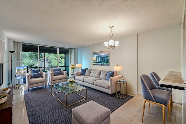 living area with a wall of windows, a notable chandelier, and light tile patterned flooring