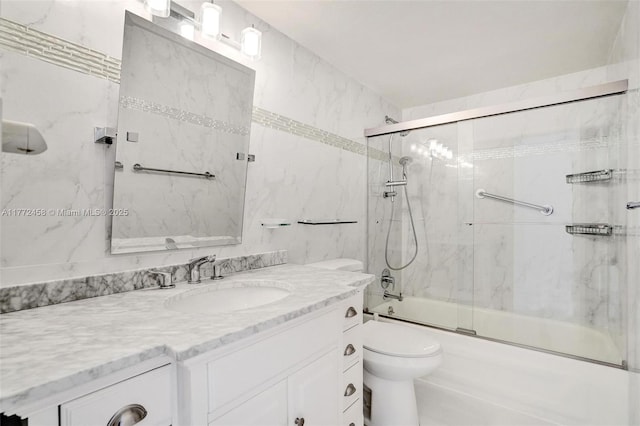 3113 S Ocean Dr Unit 410, Hallandale Beach, FL 33009 - bathroom with combined bath / shower with glass door, vanity, and toilet