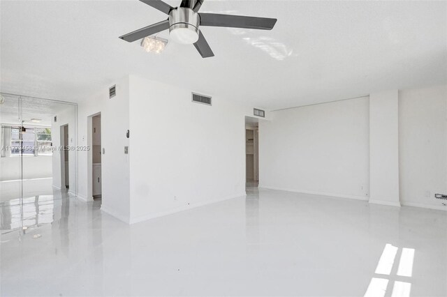 3113 S Ocean Dr Unit 410, Hallandale Beach, FL 33009 - empty room featuring a ceiling fan, baseboards, and visible vents