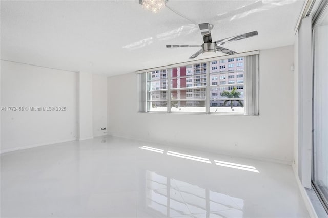 3113 S Ocean Dr Unit 410, Hallandale Beach, FL 33009 - empty room with baseboards and ceiling fan