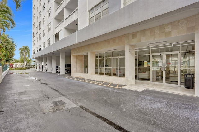 3113 S Ocean Dr Unit 410, Hallandale Beach, FL 33009 - view of building exterior with covered parking