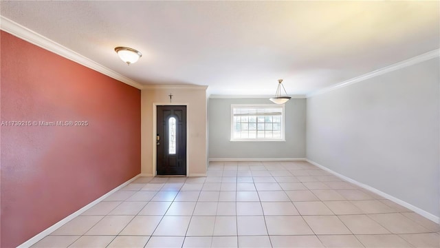 foyer entrance featuring light tile patterned floors, baseboards, and ornamental molding
