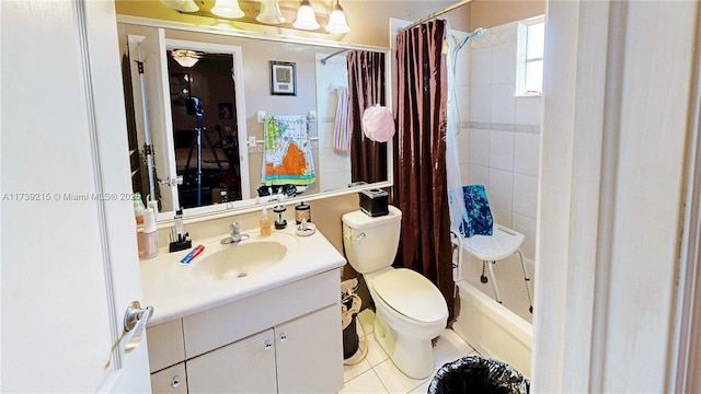 bathroom with shower / tub combo, tile patterned flooring, vanity, and toilet