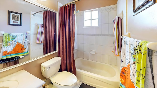full bath featuring shower / bath combo, toilet, and vanity