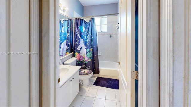 full bathroom featuring shower / bath combination with curtain, toilet, tile patterned flooring, and vanity