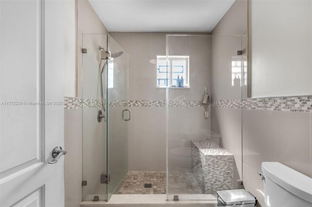 12332 NW 97th Ct, Hialeah Gardens, FL 33018 - full bath with toilet, tile walls, and a stall shower