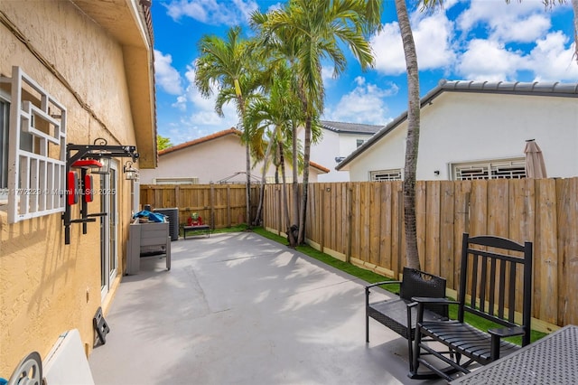 12332 NW 97th Ct, Hialeah Gardens, FL 33018 - view of patio / terrace featuring a fenced backyard