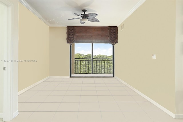 unfurnished room with ornamental molding, ceiling fan, baseboards, and light tile patterned floors