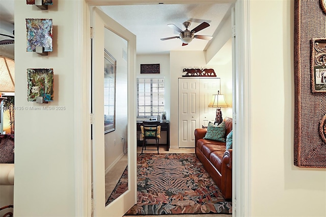 corridor featuring baseboards