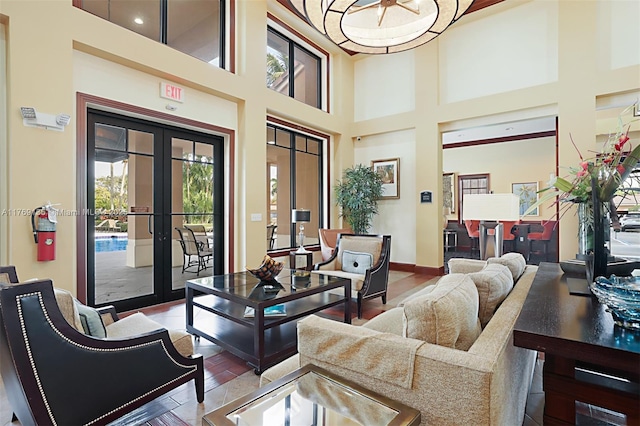 common area featuring a towering ceiling