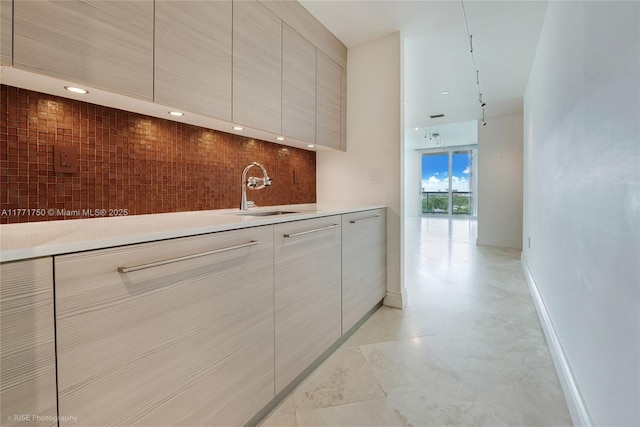 2645 S Bayshore Dr Unit 902, Miami, FL 33133 - kitchen featuring modern cabinets, a sink, light countertops, baseboards, and recessed lighting