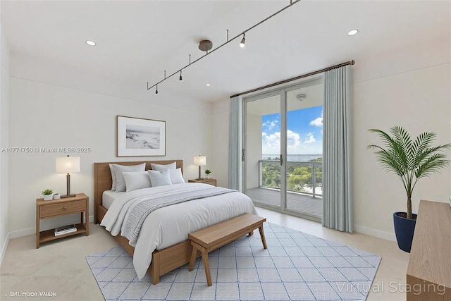 2645 S Bayshore Dr Unit 902, Miami, FL 33133 - bedroom with access to outside, light colored carpet, rail lighting, baseboards, and recessed lighting