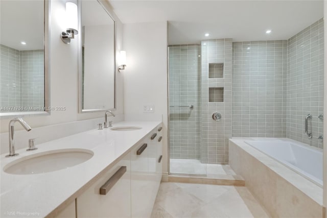 2645 S Bayshore Dr Unit 902, Miami, FL 33133 - bathroom featuring tile patterned floors, a tile shower, a relaxing tiled tub, double vanity, and recessed lighting