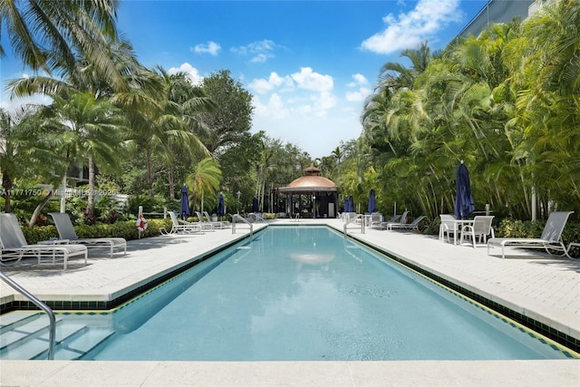 2645 S Bayshore Dr Unit 902, Miami, FL 33133 - community pool with a gazebo and a patio area