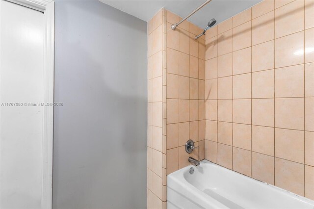 full bath featuring washtub / shower combination