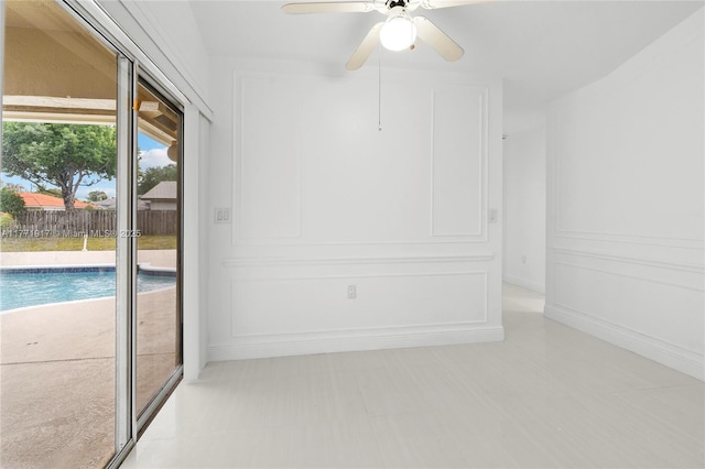 1400 SW 54th Ave, Plantation, FL 33317 - spare room with a decorative wall and ceiling fan