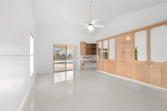 1400 SW 54th Ave, Plantation, FL 33317 - unfurnished living room featuring light tile patterned flooring, a ceiling fan, and high vaulted ceiling
