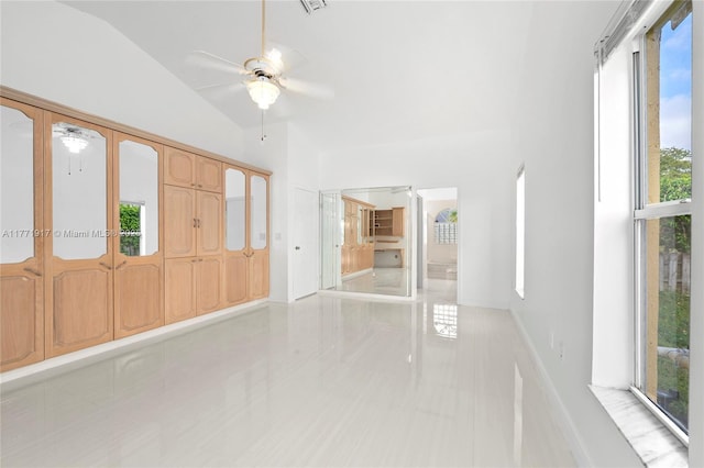 1400 SW 54th Ave, Plantation, FL 33317 - tiled spare room featuring a ceiling fan and vaulted ceiling