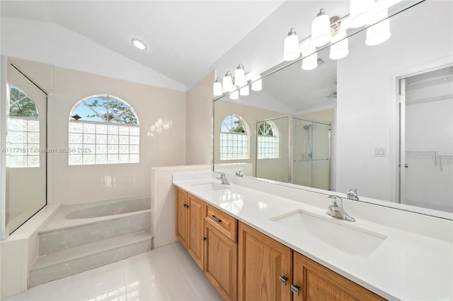 1400 SW 54th Ave, Plantation, FL 33317 - bathroom with vaulted ceiling, healthy amount of natural light, a garden tub, a stall shower, and double vanity
