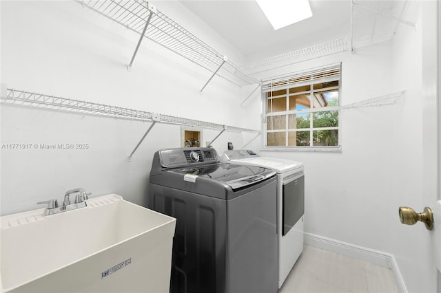 1400 SW 54th Ave, Plantation, FL 33317 - laundry area featuring separate washer and dryer and baseboards