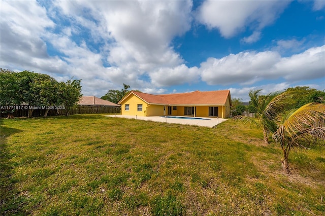 1400 SW 54th Ave, Plantation, FL 33317 - rear view of house featuring stucco siding, a patio area, and a tile roof