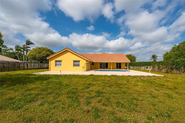 1400 SW 54th Ave, Plantation, FL 33317 - rear view of property with a patio area, stucco siding, and a tiled roof