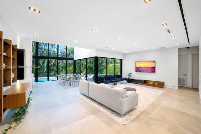 2421 NE 199th St, Miami, FL 33180 - living area with recessed lighting and a wall of windows