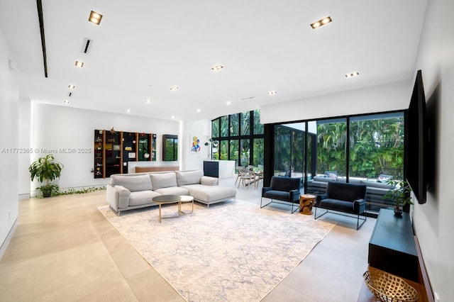 2421 NE 199th St, Miami, FL 33180 - living room featuring recessed lighting