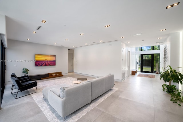 2421 NE 199th St, Miami, FL 33180 - living room featuring visible vents and recessed lighting